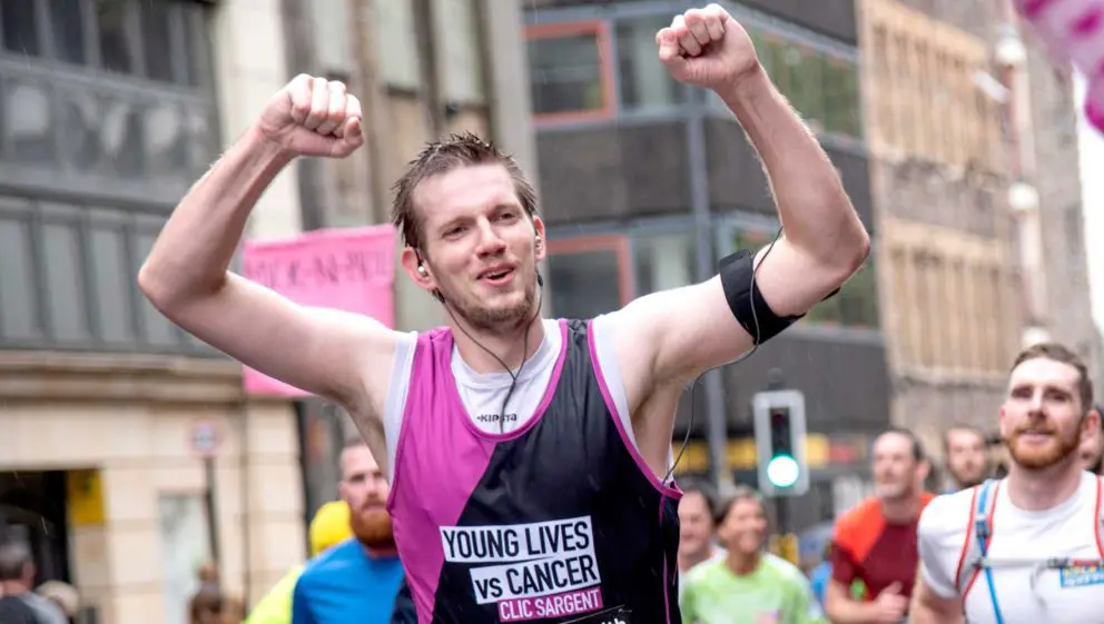 Man running the Newport 10k for CLIC Sargent